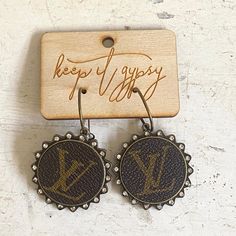 Included: one pair of earrings Sizing: 1.75 x 1.75 Authentic LV logo *Attention/ Disclosure: This product is an upcycled product made from legally purchased, used LV products. This product is not endorsed by LV and does not fall under any warranty by LV. Farmhouse Earrings, Upcycled Product, Upcycled Lv, Lv Logo, New Home Decor, Chic Farmhouse, Designer Items, Christmas Items, Purse Charms