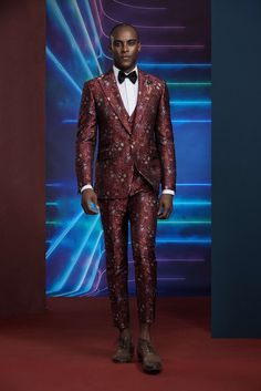 There is no dull angle in this one of a kind red patterned tuxedo for men or women. It is perfect for once in a lifetime moments where you will be highlighted and definitely the center of attention. FREE SHIPPING ON ORDERS OVER $199 COLOR Red/Blue COMPOSITION N/A YARN COUNT N/A WEIGHT 290g FABRIC STYLE Jacquard OCCASION Wedding/Gala Elegant Tailored Red Tuxedo, Luxury Fitted Red Three-piece Suit, Tailored Red Tuxedo For Semi-formal Events, Red Long Sleeve Tuxedo For Semi-formal Occasions, Red Semi-formal Tuxedo Set, Cuffed Pants, Tuxedo For Men, Suit Style, Once In A Lifetime