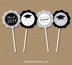 graduation cake toppers are shown in black and white