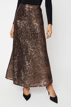 Introducing our stunning sequin midi skirt, a perfect addition to your wardrobe! This eye-catching skirt features a beautiful arrangement of shimmering sequins that will make you shine wherever you go. This skirt exudes elegance and sophistication. Whether you're attending a special event or simply want to make a statement, this sequin skirt is sure to turn heads and make you feel like a true fashionista. Sequin Midi Skirt, Dorothy Perkins, Special Event, Make You Feel, Feel Like, Special Events, Sequin Skirt, Midi Skirt, Sequin