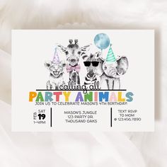 an animal themed birthday party with giraffes and balloons