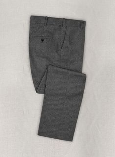 If you are looking for the structure, formality, and professionalism of a business pants opt for our Herringbone Gray Flannel Wool pants. Crafted from pure wool, the pants being luxurious to feel boasts a contemporary update on a classic staple and is a fine addition to your work-to-weekend wardrobe. Wear it with matching waistcoat and jacket, a light blue cotton shirt, a dark gray tweed tie and black tasselled loafers. 
 
 Look Includes  Herringbone Gray Flannel Wool Fabric  Flat Front Pleats Pants Stand, Grey Tweed Suit, Peaky Blinders Suit, Green Velvet Jacket, White Linen Suit, Herringbone Tweed Jacket, Blue Linen Shirt, Royal Blue Suit, Blue Chinos