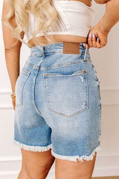 - Update your denim collection with this trendy option! - Unlined denim material with distressed detailing - A rigid non-stretch front and a stretchy back - A high waistline with belt loops and five button closure - A functional four pocket cut - A flattering silhouette that ends in frayed hemlines Measurements 1XL : Front Rise 14.5", Hip 44", Inseam 5.5", Length 17", Waist 34". 2XL : Front Rise 15.5", Hip 46", Inseam 5.5", Length 18", Waist 36". 3XL : Front Rise 16", Hip 48", Inseam 6", Length Ripped Medium Wash Denim Bottoms, Ripped Denim Bottoms In Medium Wash, Distressed Dark Wash Denim Jean Shorts, Medium Wash Mid-rise Denim Jean Shorts, Mid-rise Medium Wash Denim Jean Shorts, Ripped Dark Wash Denim Jean Shorts, High Waist Distressed Denim Jean Shorts, Ripped Dark Wash Denim Shorts, High-rise Distressed Denim Shorts