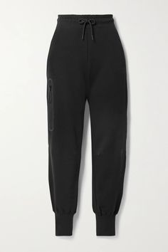 Nike's cotton-blend jersey track pants are backed in warm fleece, so they'll keep you cozy on chilly days. They have a flexible drawstring waistband and zipped pocket at the side to keep your phone and cardholder secure. Wear them with a hoodie and sneakers.Wear it with: [Nike Top id1254324], [Nike Sneakers id1187340], [Alexander Wang Tote id1254775]. Jean Trench Coat, Nike Top, Nike Outfits, Nike Sneakers, Clothes Collection, Everyday Wardrobe, Sport Pants, Nike Tops, Swimwear Tops