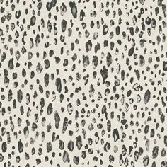 an animal print pattern with black spots on white background, suitable for wallpaper or fabric