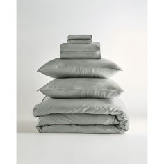 a stack of pillows sitting on top of each other