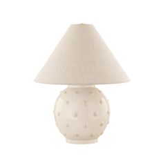 a white table lamp with a beige shade on the top and polka dot pattern on the bottom