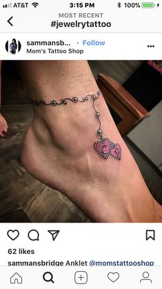 a woman's foot with a tattoo on it and the words hello kitty written in pink