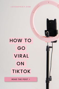 a pink ring light with the words how to go virtual on tiktok read the post