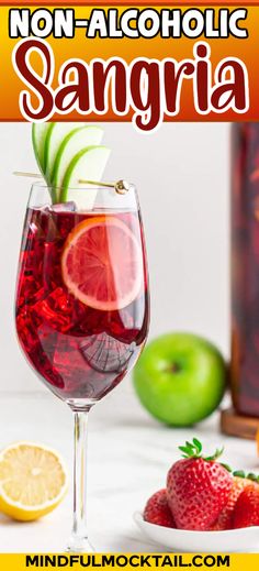 a close up of a glass of sangria on a table