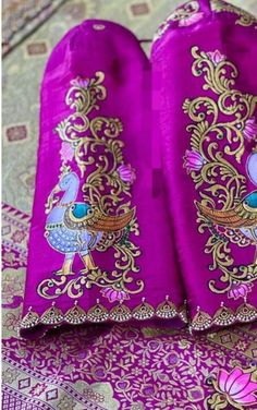 two purple cloths with gold designs on them