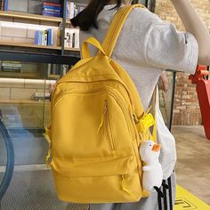 UAKISS - Cool Lady Travel Women Kawaii Backpack Fashion Girl Waterproof College Student Bag Teenager Book Bag Female Laptop Cute Backpack Color: black/pink/yellow/blue/white Size: length 29cm,Width 13cm,Height 40cm Yellow Kawaii Bag For Back To School, Cute Yellow Backpack For Students, Cute Yellow School Backpack, Cute Yellow Student Bags, Yellow Kawaii School Bag, Kawaii Yellow School Bag, College Student Bag, Casual Elegant Style, Travel Women