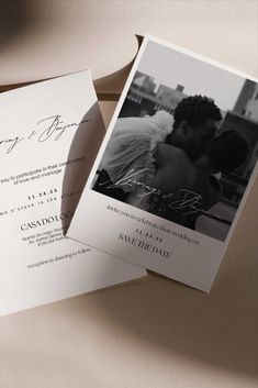 a wedding card with an image of a couple kissing on the forehead and in front of it