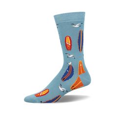 socks with a pattern of surfboards and seagulls on a blue background. the surfboards are orange, blue, and white. the seagulls are white with black eyes. Casual Blue Socks For Summer, Comfortable Blue Summer Socks, Comfortable Blue Socks For Summer, Sock Lovers, Ride The Wave, Blue Backdrop, Mens Crew Socks, Bamboo Socks, Blue Backdrops