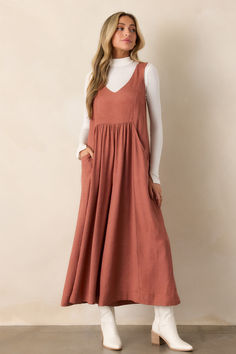 Elevate your style with our She's So Lovely Terracotta Wide Leg Jumpsuit! This stunning piece features a rich, warm color and a flattering silhouette. Ideal for any occasion, it's both elegant and comfortable. Make a statement and stand out with our unique and eye-catching jumpsuit. This terracotta jumpsuit features a v neckline, a sleeveless design, functional pockets, and flowy wide legs. Fall Sleeveless Relaxed Fit Jumpsuits And Rompers, Terracotta Jumpsuit, New England Fall, China Design, Red Jumpsuit, Wide Legs, V Neckline, Wide Leg Jumpsuit, Warm Colors