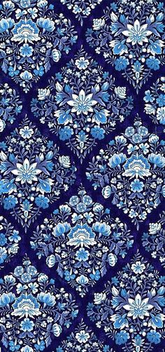 a blue and white floral pattern on fabric