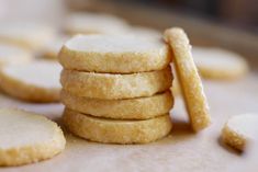 a stack of sugar cookies sitting on top of a counter