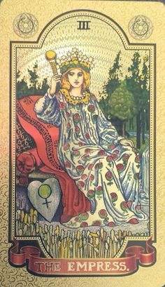 a tarot card with an image of a woman sitting on top of a chair