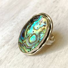 Abalone shell stering ring Silver Shell-shaped Ring For Gift, Unique Silver Shell Rings, Unique Silver Shell Jewelry, Elegant Silver Abalone Shell, Handmade Silver Abalone Shell, Unique Sterling Silver Shell Jewelry, Silver Shell Rings For Gift, Oval Mother Of Pearl Ring With Polished Finish, Silver Oval Rings With Mother Of Pearl