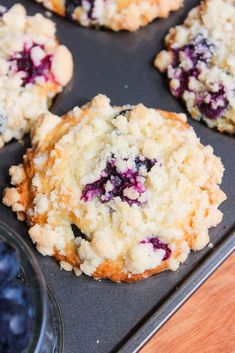 blueberry muffins in a muffin tin ready to be eaten