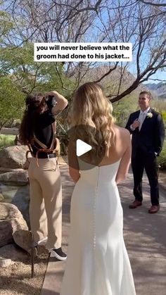 a woman in a white dress standing next to a man