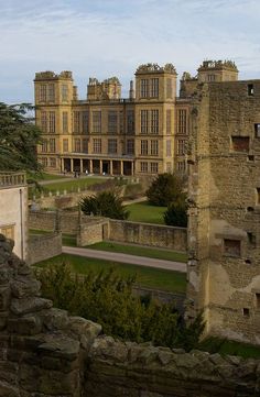 an old castle with many windows and towers