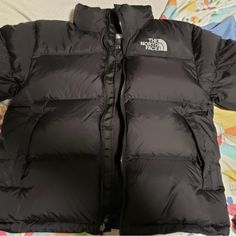 Brand New Never Worn The North Face Puffer Jacket With Pockets For Fall, The North Face Fall Puffer Jacket With Pockets, The North Face Puffer Outerwear For Cold Weather, The North Face Outerwear For Cold Weather, The North Face Outerwear With Pockets For Cold Weather, The North Face Outerwear For Cold Weather With Pockets, The North Face Puffer For Cold Weather, The North Face Cold Weather Puffer Outerwear, The North Face Black Puffer Jacket For Outdoor Activities