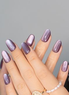 Transform your nails with these stunning Purple Cat Eye Press On Nails! Designed for a sleek and sophisticated look, these nails feature a smooth, mirror-like cat eye finish in a rich, deep purple hue that reflects light beautifully. Whether attending a special event or wanting to add luxury to your everyday style, these nails provide a flawless manicure without a salon visit. 🐰Sizing Guide: XS/S/M/L XS: 14-10-11-10-8 (mm) S: 15-11-12-11-9 (mm) M: 16-12-13-12-10 (mm) L: 17-13-14-13-11 (mm) 🐰 W Cateye Purple Nails, Elegant Cat Eye Nails, Purple Nails With Foil, Purple Nails Cat Eye, Fall Nails Manicure, Purple Mirror Nails, Cat Eye Purple Nails, Fall Nails Cat Eye