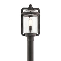 The 19.75in. Andover 1-light outdoor post mount in Weathered Zinc from the Andover collection draws its design inspiration from vintage C-clamps, an iconic necessity of the industrial era and still in use today. Kichler Andover 19.75-in Weathered Zinc Transitional Outdoor Light Post Lantern | 49869WZC Vintage Western Style, Light Post, Industrial Inspiration, Lantern Post, Kichler Lighting, Outdoor Post Lights, Seeded Glass, Post Lights, Vintage Western