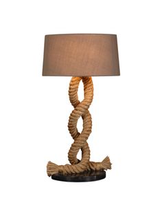 a lamp that is made out of rope and has a light shade on top of it