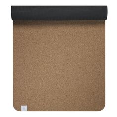 a cork board with a black mat on the bottom and an empty piece of paper underneath it