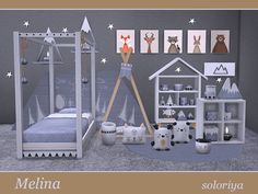 an image of a child's bedroom with animals on the wall and pictures above it