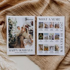 two magazine covers sitting on top of a bed next to a brown throw blanket and a white christmas tree