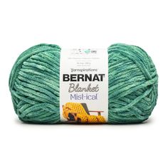 bernat blanketing mistical yarn ball in green, with yellow leopard on the side