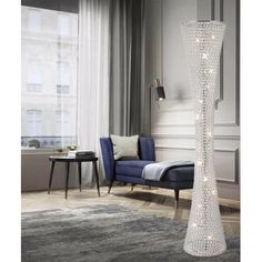 a large white floor lamp in a living room