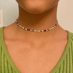 - Super cute beaded choker perfect for styling with your green and brown fits <3 - Handmade item  - Metal material: Nickel Free Zinc Alloy - Made with 0.8 mm elastic cord  - 13 inches + 1 inch chain extension - I can also make it longer or shorter! - Shipping is untracked - Message me if you have any questions <3 Green Beaded Choker For Festivals, Green Casual Beads For Festival, Adjustable Green Choker With Tiny Beads, Bohemian Green Choker With Colorful Beads, Green Tiny Beads Choker, Casual Green Choker Jewelry, Casual Green Choker Necklace, Green Choker With Tiny Round Beads, Green Tiny Beads Choker Necklace