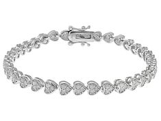 2.00ctw round white diamond, rhodium over sterling silver heart tennis bracelet. Measures approximately 3/16"W and has a hidden box clasp closure. Fine Jewelry Silver Heart Diamond Bracelet, White Gold Heart Cut Tennis Bracelet For Anniversary, Heart-shaped Diamond Tennis Bracelet In White Gold, White Gold Heart Bracelet With Diamond Accents, Heart-shaped Diamond Tennis Bracelet With Accents, Heart Cut Tennis Bracelet With Diamond Accents For Anniversary, Anniversary Tennis Bracelet With Diamond Accents, Anniversary Heart Cut Tennis Bracelet With Diamond Accents, Silver Heart Bracelet With Diamond Accents