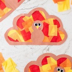 paper turkeys cut out to look like they have been made with construction paper and glue