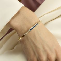 ✦14k Gold Bangle Bracelet, Hinged Cuff Bracelet Jewelry, Gift for Women Sapphire and Amethyst Stone Fashion Bracelet Gift ✦Our colorful stone hinged and locked bracelet, which we specially designed for women, is made of 14 carat gold. Since our product has a thick and hard surface, it does not deform, crush or collapse. In its design, 1st quality diamond-cut zircon stones are used. You can use our bracelet daily or on special occasions. It is also a special product that you can gift to your love 14k Gold Bangle Bracelet, Diamond Pendants Designs, Stone Fashion, Diamond Pendants, Gold Bangle Bracelet, Gold Bangle, Hard Surface, Pendant Design, Amethyst Stone