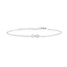 The Petite Infinity Chain Diamond bracelet is one of our most versatile chain bracelets. It has a delicate infinity symbol with 1/20 carat of bright white round diamonds and looks amazing alone or paired with your favorite bangle. Infinity Diamond Bracelet For Formal Occasions, Elegant Diamond Bracelet With Cable Chain, Formal Infinity Diamond Bracelet, Elegant Infinity Bracelet With Diamond Accents, Elegant Infinity Bracelets With Diamond Accents, Dainty Infinity Bracelet With Adjustable Chain, Dainty Infinity Bracelets With Adjustable Chain, Formal White Gold Infinity Diamond Bracelet, Minimalist Infinity Bracelet With Adjustable Chain