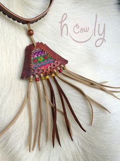 Unleash your bohemian soul with this beautiful one off unique handmade leather necklace. It is made from the finest quality brown leather. The brown leather section of the necklace has vintage hand embroidered Hmong tribal fabric incorporated into it's design. This is not only a necklace it is a piece of art. This long fringe leather choker necklace is adjustable at the back so it fits all sizes. Available in a wide range of colors. Please contact me if you would prefer a different color combina Leather Necklace Diy, Handmade Leather Necklaces, Bohemian Soul, Leather Choker Necklace, Leather Jewellery, Leather Ring, Embroidered Leather, Long Fringe, Leather Art