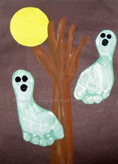 two white ghost figures standing next to a tree