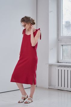 "MsWrinkle's clothing - from human to human. 100% handmade. *Description* - Linen slip dress with ties, side slits and pockets. Length can be adjusted with the ties; - Dress is also available in knee length - https://www.etsy.com/listing/691981297/linen-tie-dress-linen-slip-dress-linen?ref=shop_home_active_1&frs=1 - High quality European linen; - Washed and softened (doesn't shrink anymore); - Medium weight linen (150 g/m2); - Our linen is OEKO-TEX certified that meets human ecological safet Casual Summer Suspender Dress With Tie Straps, Beach Sundress Maxi Dress With Pockets, Red Vacation Dresses With Pockets, Red Vacation Dress With Pockets, Casual Sleeveless Dress With Tie Back, Casual Knee-length Suspender Dress For Summer, Casual Midi Dress With Tie Fastening, Casual Midi Dress With Tie Fastening For Vacation, Summer Cotton Maxi Dress With Knotted Straps