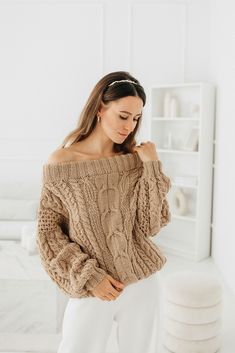 "Beige sweater womencable sweater. Off-the-shoulder sweater thanks to the beautiful knitted pattern, it will fit well on any type of female figure. The open line of the shoulders will hide the arms, stylishly emphasize the graceful neck and collarbones. Sweater is made of wool blend (50 % wool, 50% acrylic) yarn. Model height 175 cm / 68.90 \" and is wearing sweater size L. Sweater measurements for size S (measurements taken in a horizontal position and without stretching): Sweater Length: 55 cm Feminine Beige Knit Sweater, Oversized Beige Winter Sweater, Oversized Beige Textured Knit Sweater, Cozy Hand-knitted Beige Sweater, Chic Beige Pull-on Style Pants, Woolen Clothes, Beige Pullover, Cable Sweater, Hand Knitted Sweaters