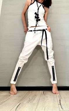 "Extravagant Women Harem Pants, Tight Zipper Pants, Women Baggy Trousers, Harem Trousers, White Loose Pants, Gothic Pants ❤️ Extravagant designs and high quality fabrics! ❤️ Materials & Care Textile, Cotton Polyester Hand wash at low temperatures. Do not machine dry. Do not iron. Do not dry clean! ❤️ Sizing We can make your piece from XS to 5XL! Everything in the shop can be also made according to your measures free of charge! ❤️ Shipping ✈ Ready to ship The time I need to prepare an order f White Loose Pants, Gothic Pants, Harem Trousers, Trousers White, Baggy Trousers, Zipper Pants, Diy Sewing Clothes, Fashion Victim, Womens Workout Outfits