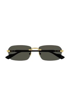 A narrow rectangular frame defines this pair of sunglasses in gold-toned metal, recalling popular styles from the '90s. A Web enamel detail and the Interlocking G feature along the temples, completing the silhouette with archival references. 100% UV Protection Frame height: 3.6cm Frame Width: 13.9cm Temple length: 140mm Lens height: 35.9mm Nose bridge length: 16mm Frame Material: Metal Gucci Square Frame Metal Sunglasses, Gucci Gold Rimless Sunglasses, Gucci Gold Tinted Sunglasses, Chanel Loafers, Men Sunglasses, Popular Styles, Metal Sunglasses, Gucci Sunglasses, Nose Bridge