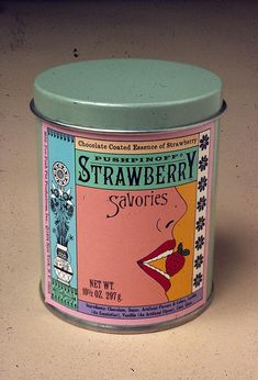 an old fashioned strawberry savors tin sitting on a counter