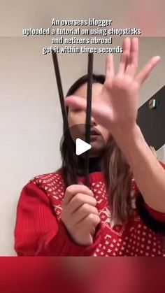 a woman holding scissors up to her face with the caption'an overexens bigger object than a portrait using chopsticks and material around 90's with three seconds