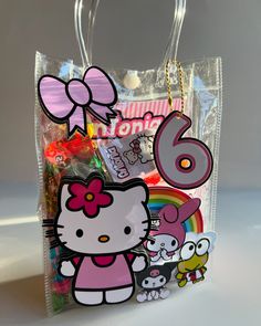 a hello kitty bag filled with candy and candies