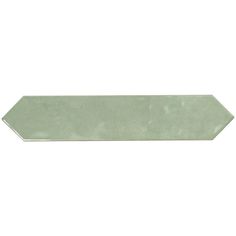 an arrow shaped tile in light green on a white background, with the top corner slightly down